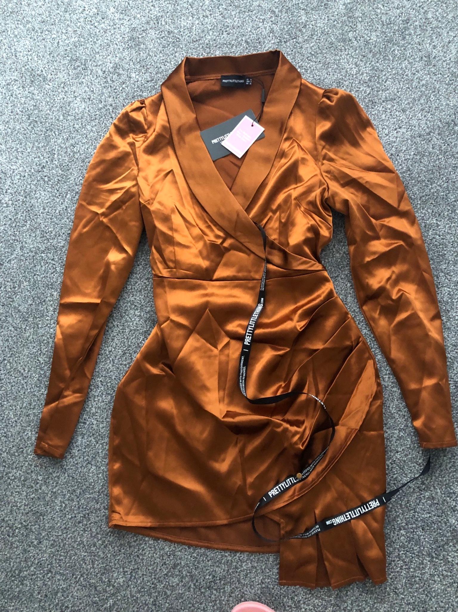 Rust satin wrap over ruched bodycon 